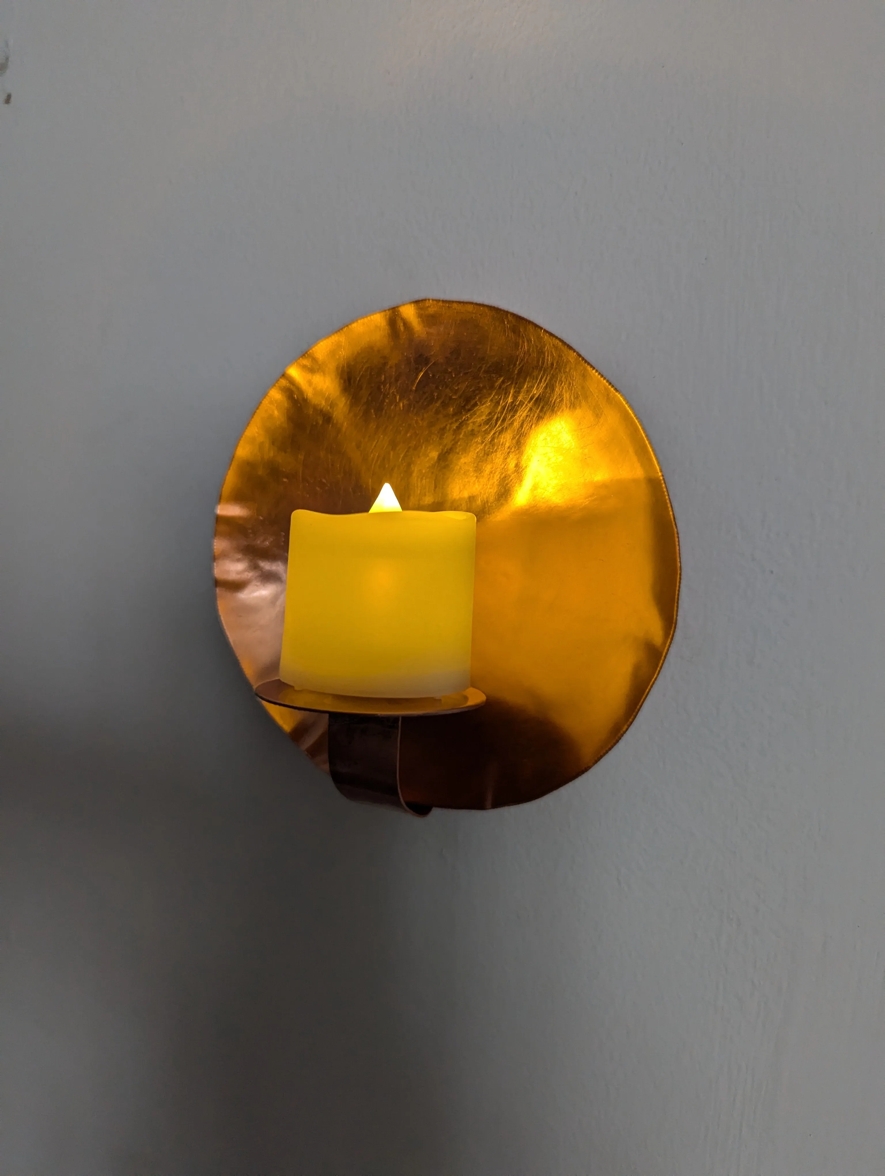 Copper wall sconce, ambient lighting